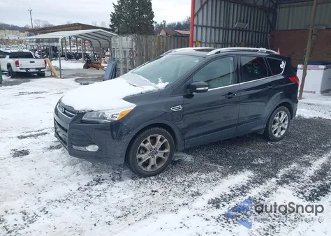 2015 Ford Escape Titanium z USA, uszkodzony, nr VIN 1FMCU9J91FUC20067